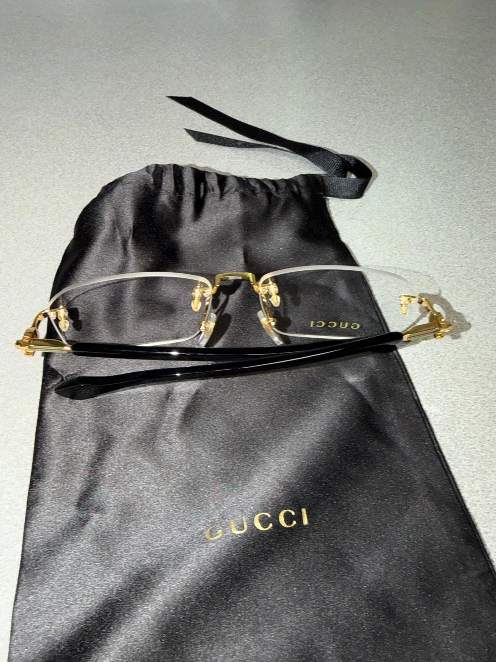 Gucci Men’s Rimless Eyeglasses Gold and Black Accents
